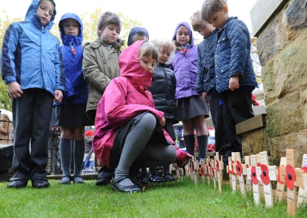 Pupils from St Mary's School, Horsham picture at the Armistice service 2013. Photo by Derek Martin