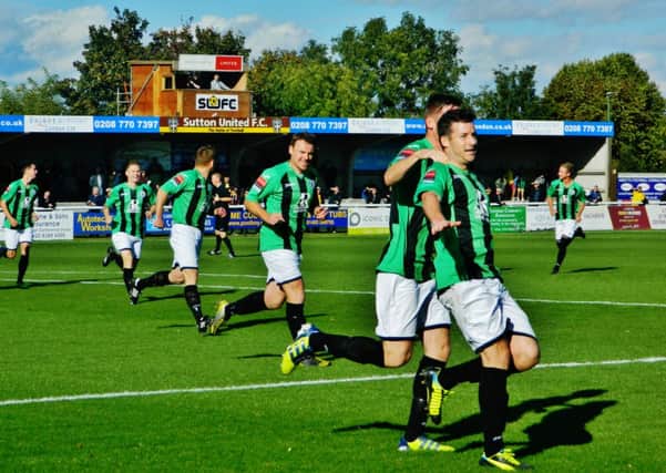 Burgess Hill players celebrate a goal against Sutton. Picture by Emily Hodgkinson