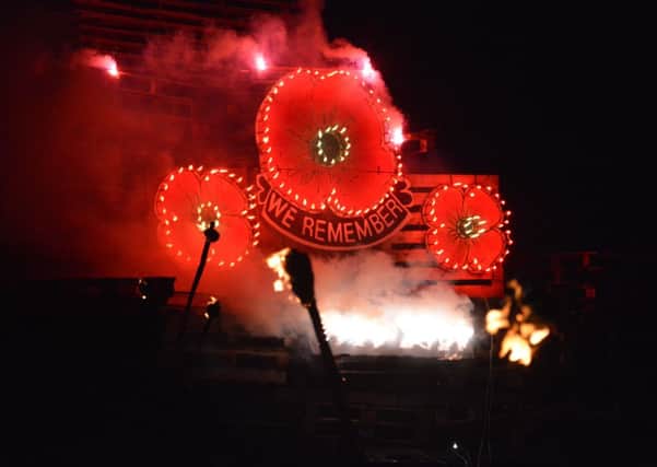 Rye Bonfire Society torchlight procession through Rye, bonfire and fireworks. Saturday November 8th 2014. SUS-141011-082640001