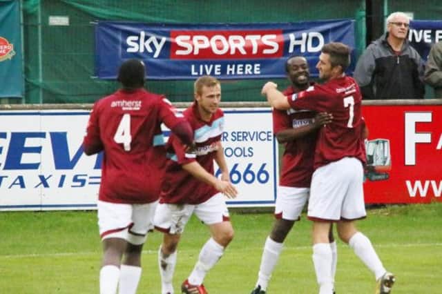 Hastings United celebrate scoring in the 5-1 win away to Faversham Town. Picture courtesy Joe Knight