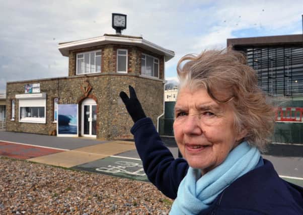 W45836H14   Helen Soloman would like to see the clock on top of the beach kiosk restored to its former glory