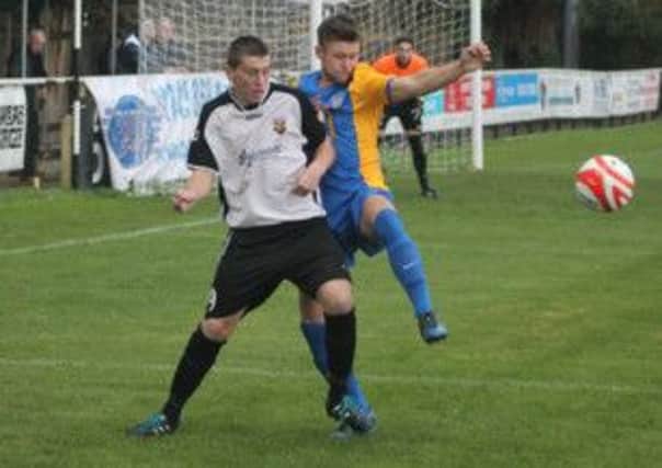 Josh Irish in action against Eastbourne - he was Pagham's scorer   Picture by Roger Smith