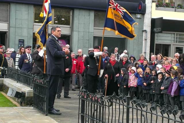 Horsham District Council chairman address the crowd following a two minutes' silence on Armistice Day