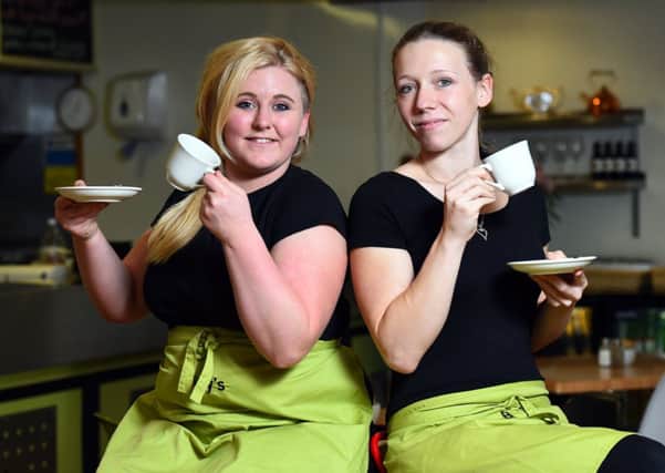 Billy's on the Road Cafe. Billy's has achieved high food hygiene ratings. Pictured are staff member's L-R Meg Fuller and Becca Burston. Billinghurst.  Picture : Liz Pearce. LP111114BC03 SUS-141111-131938008