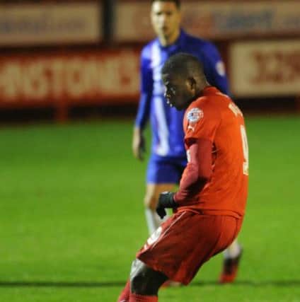 Crawley Town's Izale McLeod scores from the penalty spot against Gillingham (Pic by Jon Rigby) SUS-141211-000611002