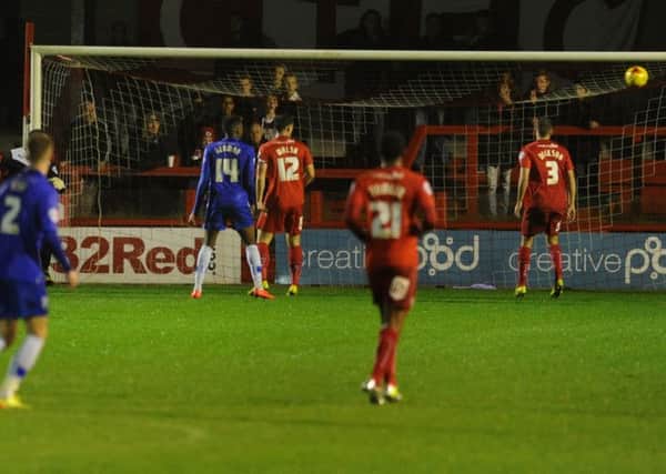 Crawley Town feel the pressure from Gillingham.  (Pic by Jon Rigby) SUS-141211-000636002