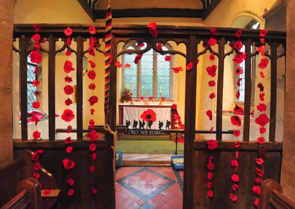 7/11/14- Poppy display at Playden Church to raise money for the charity Combat Stress. SUS-140711-155443001