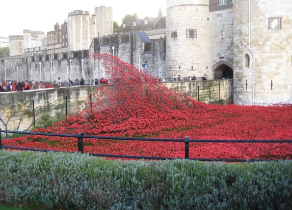 Woods Travel raised £1,500 for the Poppy Appeal SUS-141211-095254001