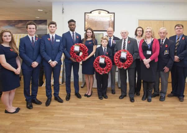 Old Boys join Steyning Grammar School students for rememberance service SUS-141211-104436001