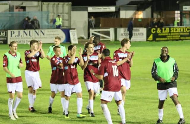 Hastings United celebrate the 5-1 win away to Faversham Town on Saturday. Picture courtesy Joe Knight
