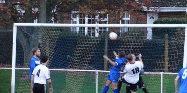 Penalty box action from Bexhill United's 3-3 draw away to Storrington yesterday. Picture courtesy Mark Killy