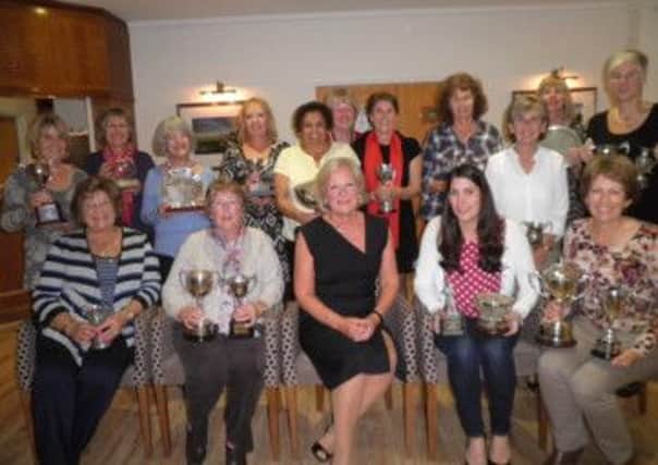all the trophy winners who were present at the event, along with Lady Captain, Di Beningfield.