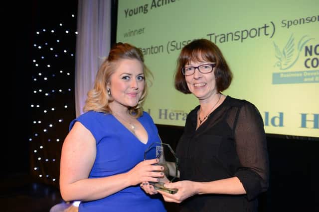 WH 141114 Adur and Worthing Business Awards, 2014. Young Achiever winner Sian Panton (Sussex Transport), presented by Sue Dare (Principal of Northbrook College). Photo by Derek Martin SUS-141115-204225001