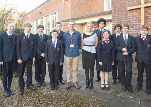 Author Matt Whyman and Cheryse Rahaman with some students from the workshop