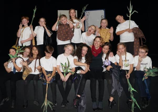 Pupils and staff from East Preston Junior School celebrating their play success SUS-141117-153337001