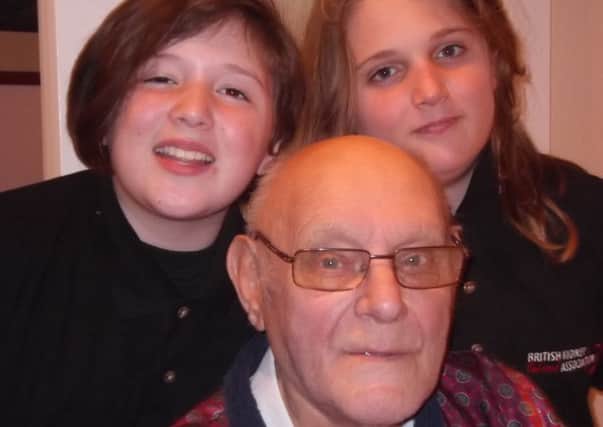 Left, Eva Chapman, nine, pictured with her brother Alex, ten, and their grandfather, Gordon Chapman, 81 SUS-141118-095346001