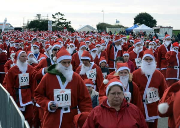 Littlehampton will become a sea of red over the weekend when hundreds of Santas descend  on the town