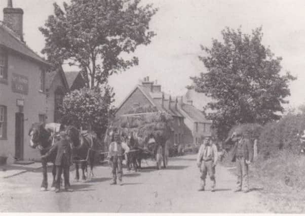 Postcard showing Small Dole street and the Fox and Hounds Inn