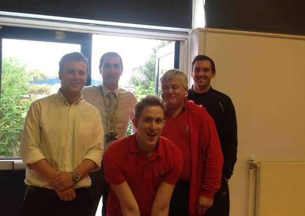 Male members of staff at Southwater Junior Academy taking part in Movember SUS-141124-120851001