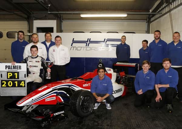 Will Palmer celebrates the championship victory with the HHC Motorsport team