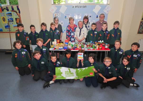 18/5/14- 1st Battle Cub Scouts collecting food  for Battle food bank. SUS-140520-091647001