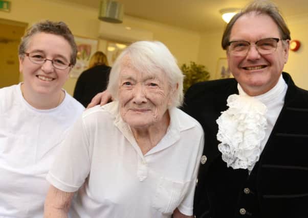 The High Sheriff, right, with Jamie Tutt, senior care assistant, and Molly Jones, 102   D14481334a