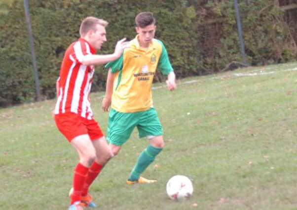 Curtis Coombes, pictured here against Steyning Town earlier this month, scored his first senior goal of the season in Westfield's 3-2 defeat at Midhurst & Easebourne on Saturday