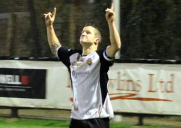 Scott Murfin celebrates his winner against Newhaven  Picture by Roger Smith