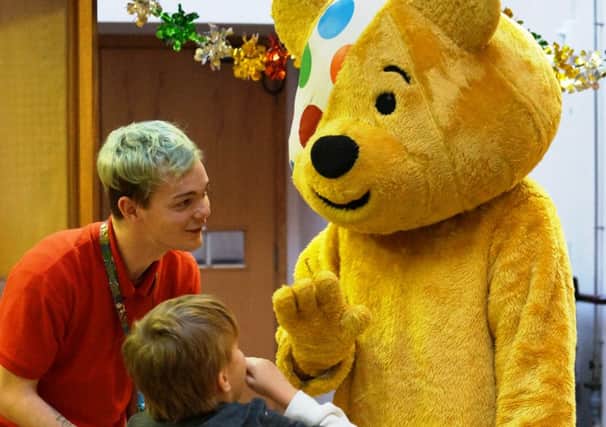 Luke Carter and supervisor Ricky Dagnell with Pudsey