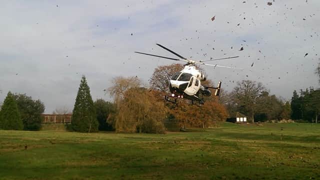 Air ambulance over Beech Hurst Gardens Picture by Gerald Liddell