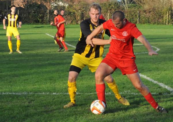 Dave Storey in possession for Bosham against Southwick   Picture by Kate Shemilt C141068-1