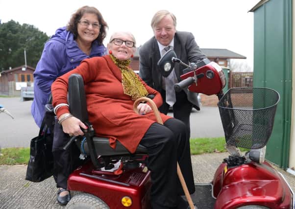Marjorie Lioret, with June Caffyn and Alan Gammon of Littlehampton Shopmobility