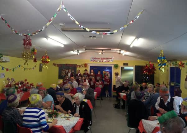 Coldwaltham Youth Club holds Christmas party for senior citizens SUS-140212-114608001