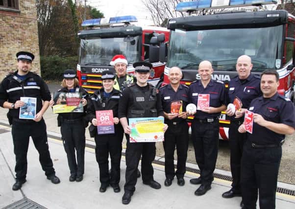 Members of the emergency services promote the multicutural Christmas community safety event