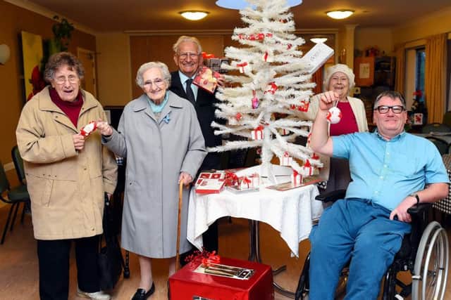 Age UK Xmas. Age UK Christmas season activites promotion picture. Age UK Horsham District. Pictured are centre user's L-R Betty Vallance, Lal Hall , Bernard Sawyer, Irene O'Sullivan and Martin Gailwood. Horsham.  Picture : Liz Pearce. LP021214AGE05 SUS-140212-182747008