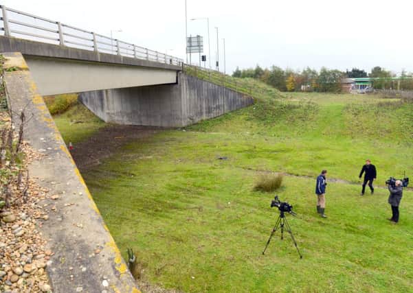 Regional news crews filming at the scene where Arundel bypass could be built from, in Crossbush