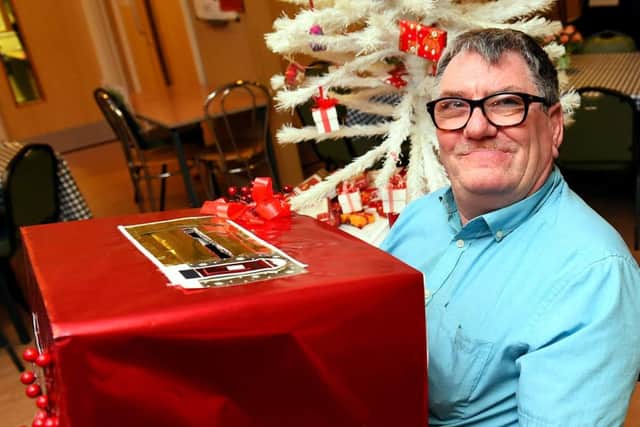 Age UK Xmas. Age UK Christmas season activites promotion picture. Age UK Horsham District. Pictured is centre user, Martin Gailwood.   Horsham.  Picture : Liz Pearce. LP021214AGE01 SUS-140212-182707008
