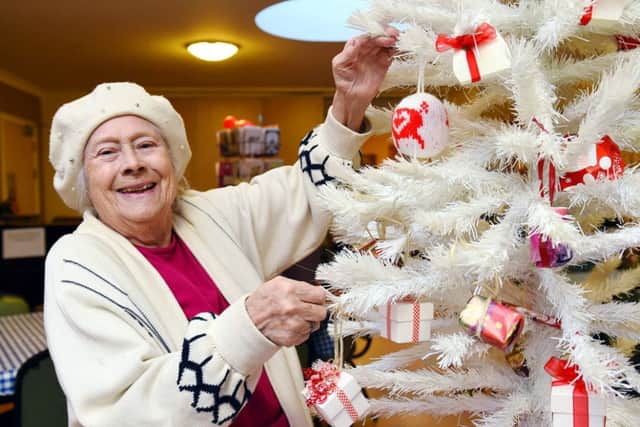 Age UK Xmas. Age UK Christmas season activites promotion picture. Age UK Horsham District. Pictured is centre user, Irene O'Sullivan.  Horsham.  Picture : Liz Pearce. LP021214AGE02 SUS-140212-182717008