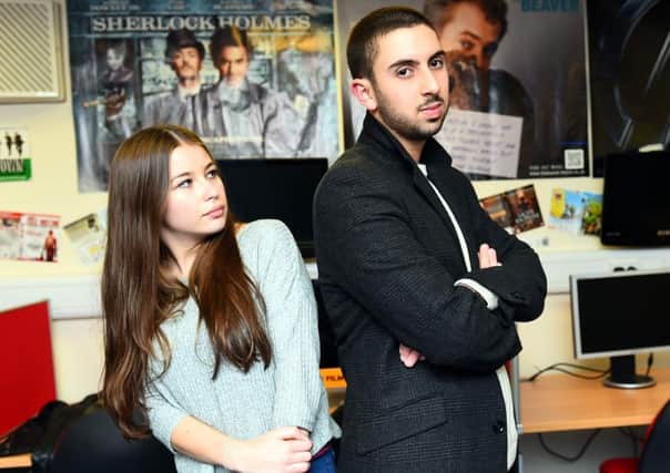Domestic Abuse Film. Students at The College of Richard Collyer have made a film to highlight domestic abuse in teenage relationships. Pictured are media students, L-R  Louise Lord (17) and  Nas Lamnouar (18). Horsham. Picture : Liz Pearce. LP021214DAF06 SUS-140212-184540008