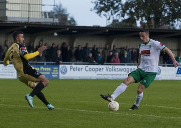Jason Prior in action against Wingate & Finchley during his recent loan spell   Picture by Tommy McMillan