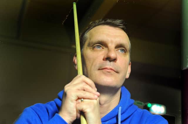 Mark Davis is through to the quarter-finals of the UK Championship in York after beating James Cahill 6-2 last night