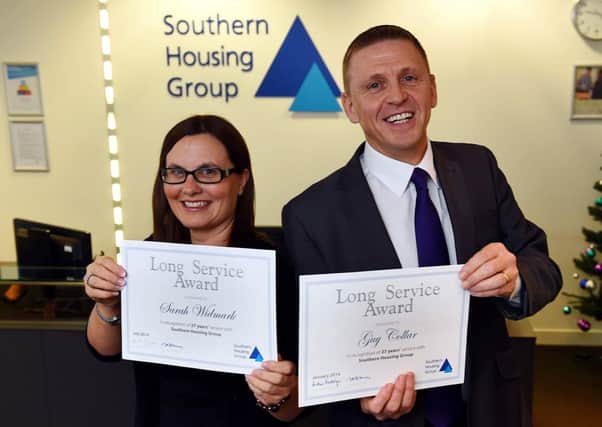 Long Service Awards. Sarah Widmark and  Guy Collar, who have been awarded long service awards at Southern Housing Group for their  27 years service. Horsham. Picture : Liz Pearce. LP051214LSA03 SUS-140512-101826008