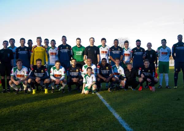The Bognor and Hendonn players before the game as part of the national Footballremembers campaign   Picture by Tommy McMillan