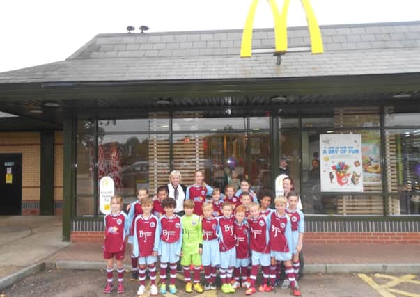 Burgess Hill Town youngsters in front of McDonalds