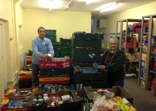 Horsham District Food Bank is one such food bank project across West Sussex. Pictured are volunteers Phil Lawrence and Gail Tomsett with donations from the public collected from Broadbridge Heath and Pulborough Tesco stores - picture submitted