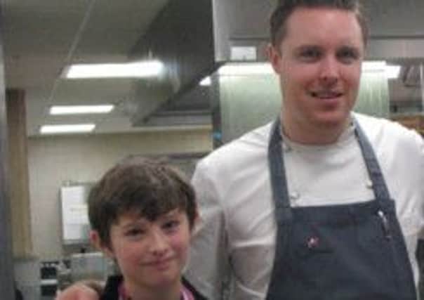 Liam Harris with head chef Steven Edwards SUS-140912-154023001