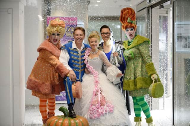 Gok Wan (The Fairy Gokmother), Kathryn Rooney (Cinderella) and Brian Conley (Buttons) during photo-call for  the pant Cinderella at the Mayflower Theatre, Southampton this Christmas. SUS-141012-114201003