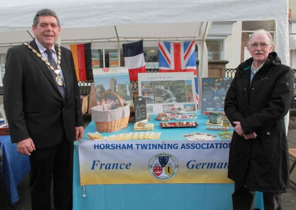 The Chairman of the HDC Brian O'Connell together with the Chairman of the Horsham Twinning Association Oliver Farley SUS-141112-171424001