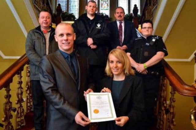 Pic caption: Eastbourne Business Crime Group was presented with The Safer Business Award by Lisa Perretta Chair of Sussex Business Crime Group at Eastbourne Town Hall. (Back row L to R): Andrew Morris, Alan Sidders, Mark Powell and P.C. Vicky Bishop with Adam Godden and Lisa Perretta (front) SUS-141216-104050001