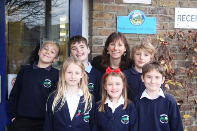 Louise Barnes with the Downview Primary School pupils who completed the course SUS-141212-084058001